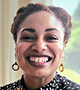 photo of Noel Price-Bracey, smiling for the camera
